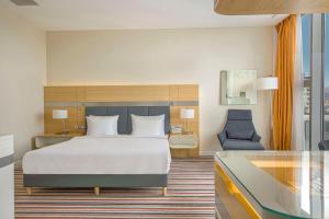 Rúm í herbergi á Radisson Blu Hotel Batumi
