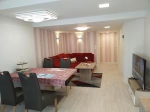 TV a/nebo společenská místnost v ubytování Ferienwohnung Baer