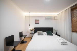 Postel nebo postele na pokoji v ubytování Shanghai M home B&B near East Nanjing Road Subway near The Bund and Peoples Square 上海小胖纸民宿-南京东路店-天赐外滩