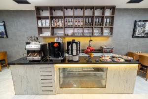 a kitchen with a counter with food on it at Luxury Life Suites in Istanbul