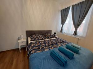Katil atau katil-katil dalam bilik di Mój apartament Krynica