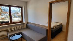 Postel nebo postele na pokoji v ubytování FW2-Allgäu