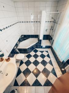 Koupelna v ubytování Hotel Tillmanns