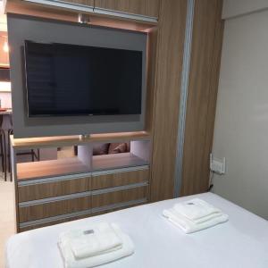 Postel nebo postele na pokoji v ubytování Estúdio completo perto ao aeroporto de Guarulhos 1