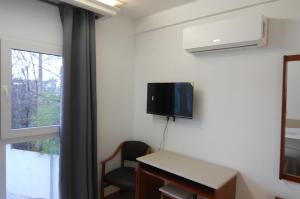 TV a/nebo společenská místnost v ubytování El Hostal 36 + 37 fotografií