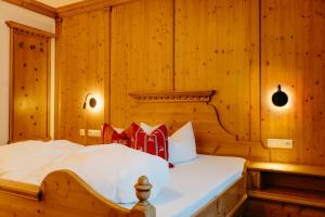 Postel nebo postele na pokoji v ubytování Hotel Klockerhof