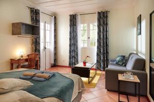 Postel nebo postele na pokoji v ubytování Relais Des Gouverneurs