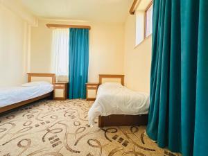 Voodi või voodid majutusasutuse SD Hotel toas