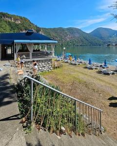 a bar on the shore of a body of water at Hotel Royal Drina in Mali Zvornik