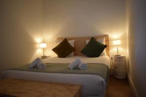 Postel nebo postele na pokoji v ubytování L'Opaline