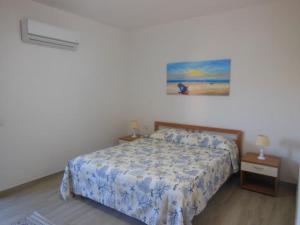 Postel nebo postele na pokoji v ubytování PUNTO ZERO ROOMS