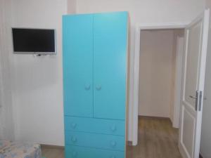TV a/nebo společenská místnost v ubytování PUNTO ZERO ROOMS