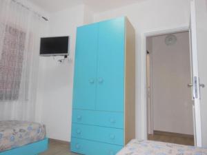 TV a/nebo společenská místnost v ubytování PUNTO ZERO ROOMS