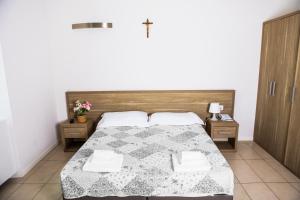 San Luigi - Residenza Gemelli客房内的一张或多张床位