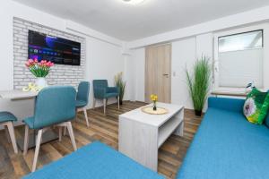 TV a/nebo společenská místnost v ubytování Strandkorb 6
