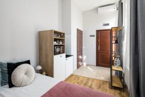 Posteľ alebo postele v izbe v ubytovaní Horizon Park Aparthotel