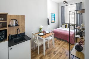Kuchyňa alebo kuchynka v ubytovaní Horizon Park Aparthotel