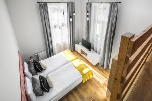 Posteľ alebo postele v izbe v ubytovaní Horizon Park Aparthotel