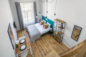 Posteľ alebo postele v izbe v ubytovaní Horizon Park Aparthotel