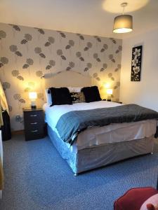 Katil atau katil-katil dalam bilik di Cozy Holiday Home in the Scenic Glen of Aherlow