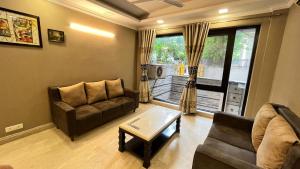 Posezení v ubytování Abode Residency near USA Embassy Delhi Safdarjung Enclave New Delhi