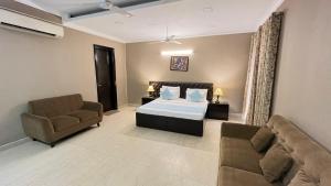 Posezení v ubytování Abode Residency near USA Embassy Delhi Safdarjung Enclave New Delhi