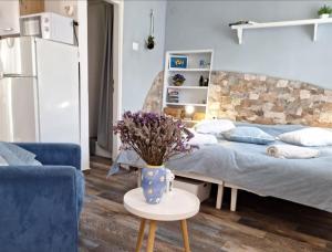 Postel nebo postele na pokoji v ubytování Apartman studio Otium