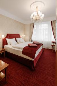 Posteľ alebo postele v izbe v ubytovaní Hotel Stefanie - VIENNA'S OLDEST HOTEL