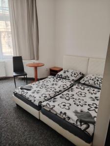 Postel nebo postele na pokoji v ubytování Centrum Ostrava - rooms