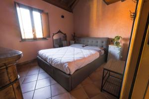 Ένα ή περισσότερα κρεβάτια σε δωμάτιο στο Casa la torre