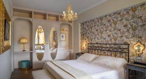 A bed or beds in a room at San Giovanni Terme Rapolano
