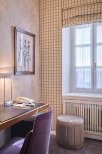 Uma área de estar em Hotel Kindli