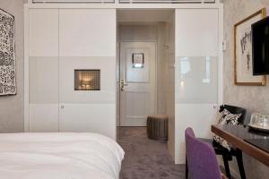 Uma cama ou camas num quarto em Hotel Kindli