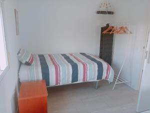 Postel nebo postele na pokoji v ubytování Apartamento La Barquera 2