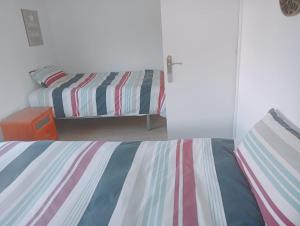 Postel nebo postele na pokoji v ubytování Apartamento La Barquera 2