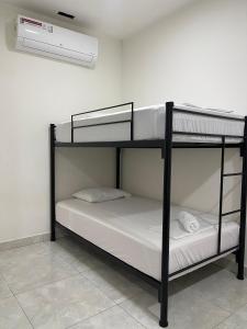Postel nebo postele na pokoji v ubytování Iquitos House + 8 fotografií