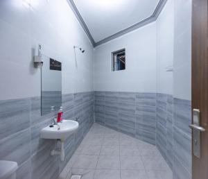 Koupelna v ubytování Upmax Cosy Home
