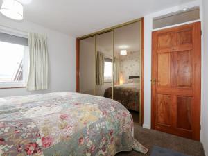 Postel nebo postele na pokoji v ubytování 11 South Snowdon Wharf