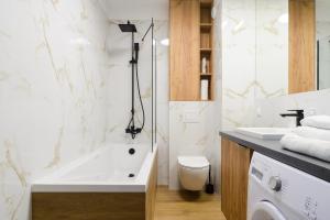 Kúpeľňa v ubytovaní Lumina premium apartments for a family