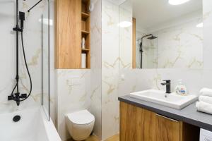 Kúpeľňa v ubytovaní Lumina premium apartments for a family