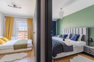 Posteľ alebo postele v izbe v ubytovaní Lumina premium apartments for a family