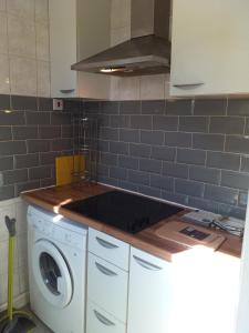 Η κουζίνα ή μικρή κουζίνα στο Charming 1-Bed Studio in Leeds