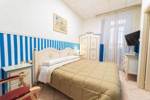 Postel nebo postele na pokoji v ubytování Le Tre Stelle