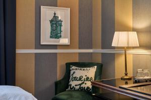 Uma cama ou camas num quarto em Hotel Kindli