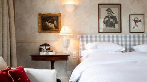 Uma cama ou camas num quarto em Hotel Kindli