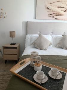 Voodi või voodid majutusasutuse HOM I Depto 1D1B Frente al Mall con Terraza Vista al Mar 2312 toas