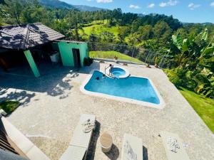 an overhead view of a swimming pool on a house at The American Dream in Jarabacoa