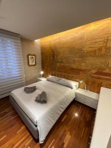 Ένα ή περισσότερα κρεβάτια σε δωμάτιο στο La casa dei miei