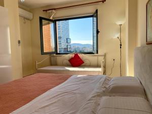 Postel nebo postele na pokoji v ubytování RTSH Apartment