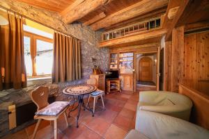 Posezení v ubytování Albergo Ristorante Grotto Miralago